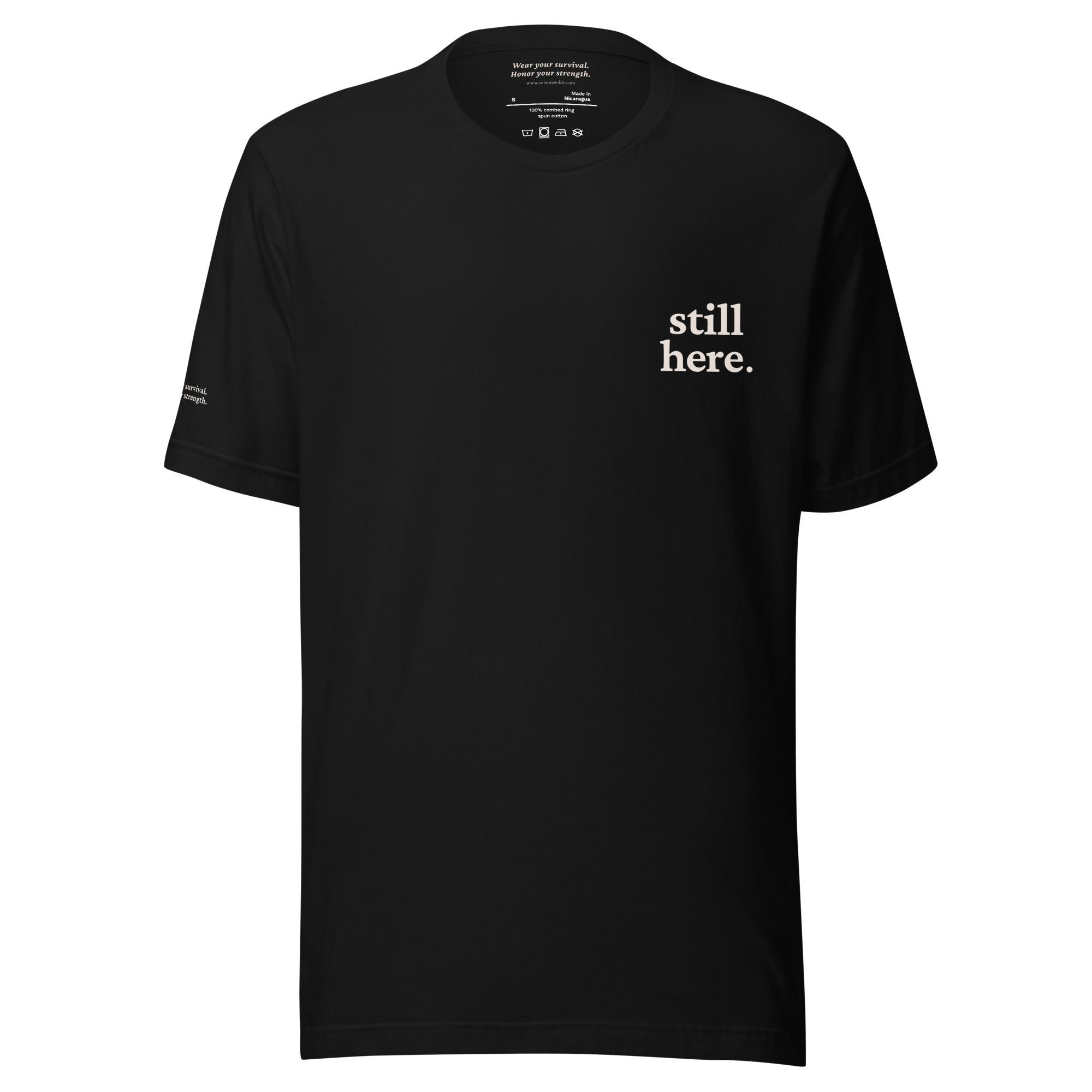 Still Here. Everyday Edition Survivor Affirmation Black Front T-Shirt