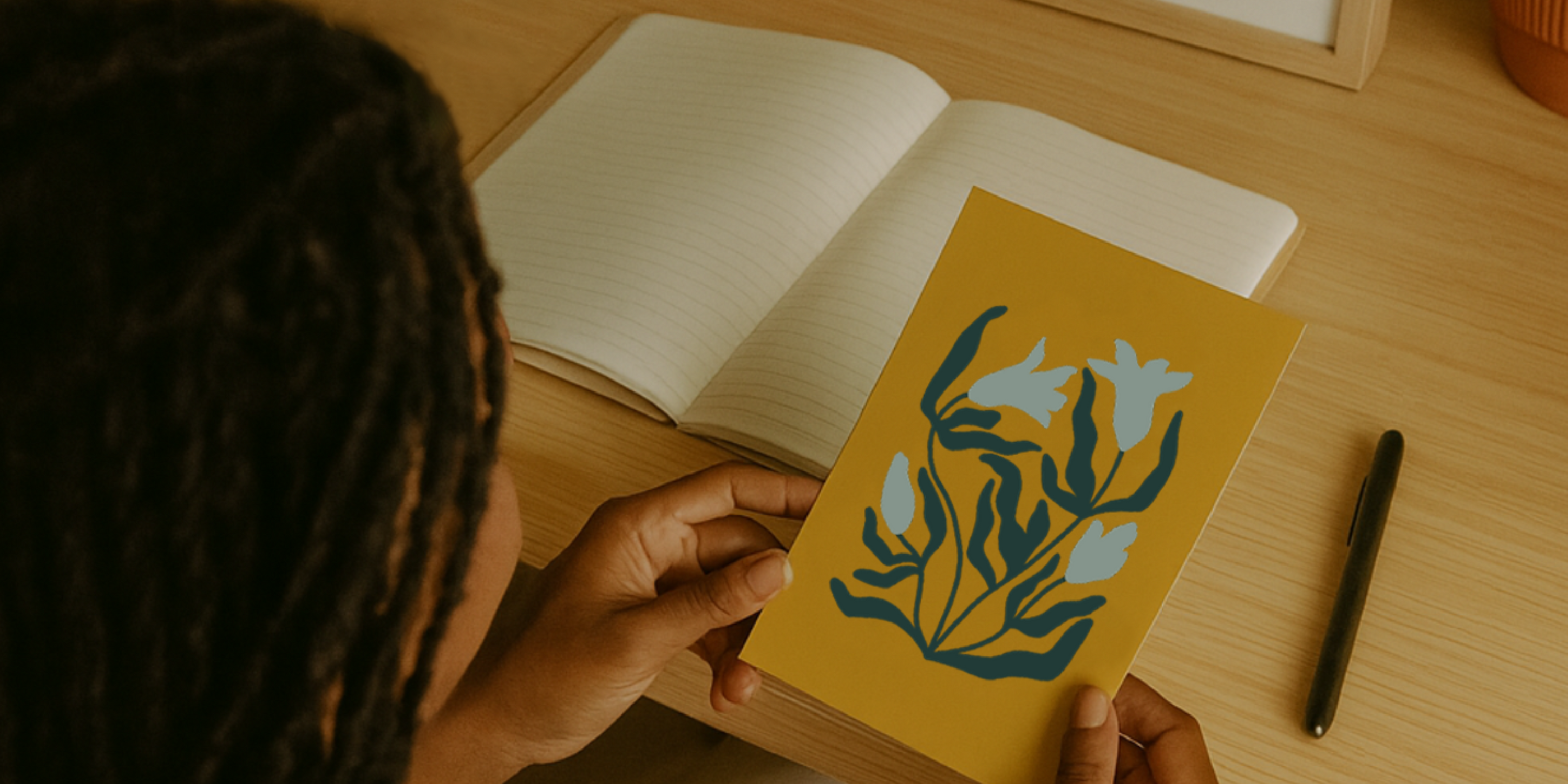 Sonesta Wilde holding a greeting card