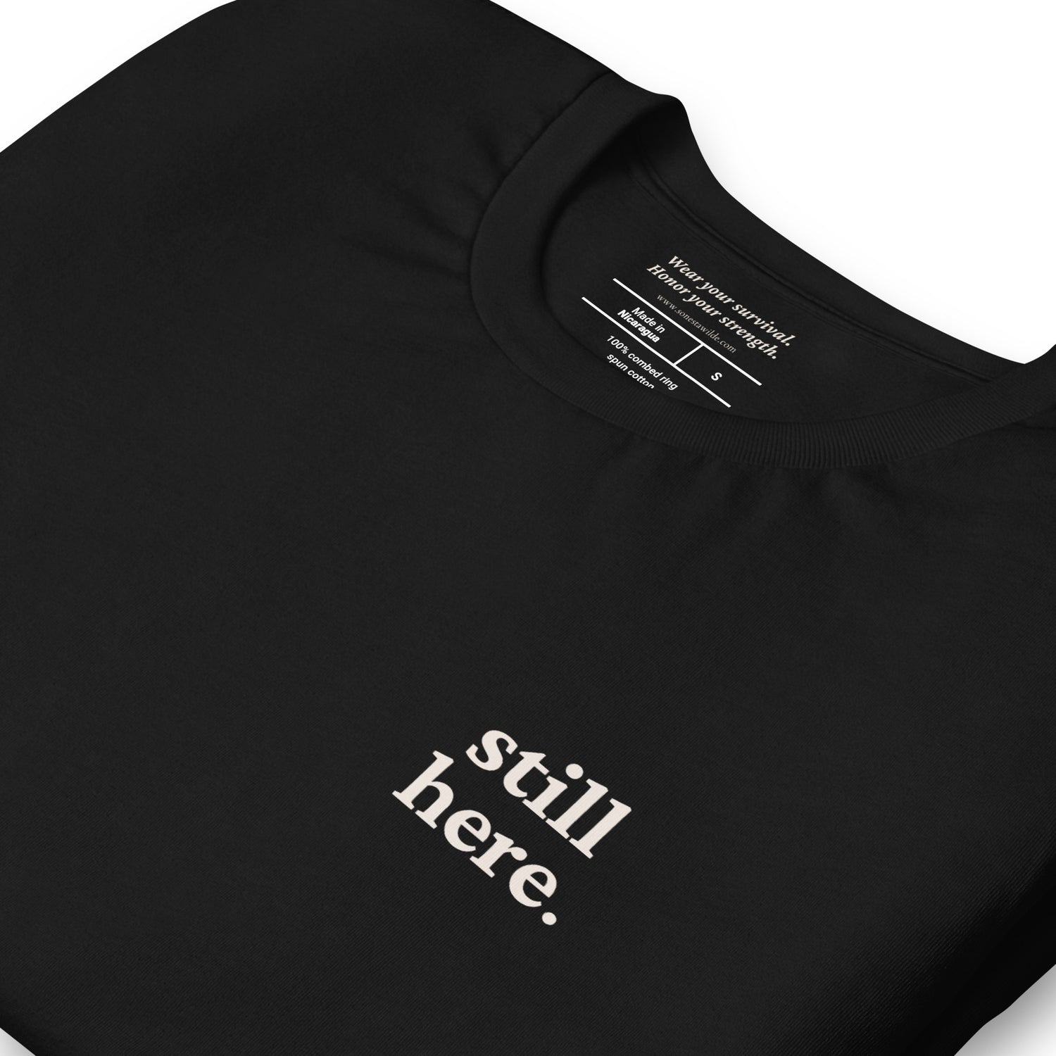 Still Here. Everyday Edition Survivor Affirmation Black Close-Up T-Shirt