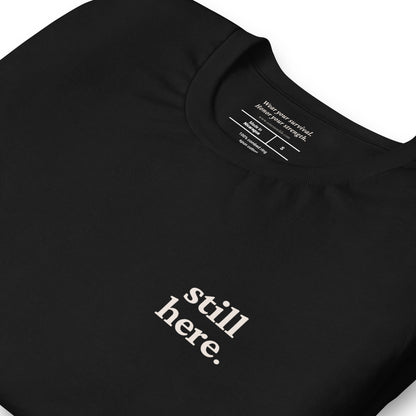 Still Here. Everyday Edition Survivor Affirmation Black Close-Up T-Shirt