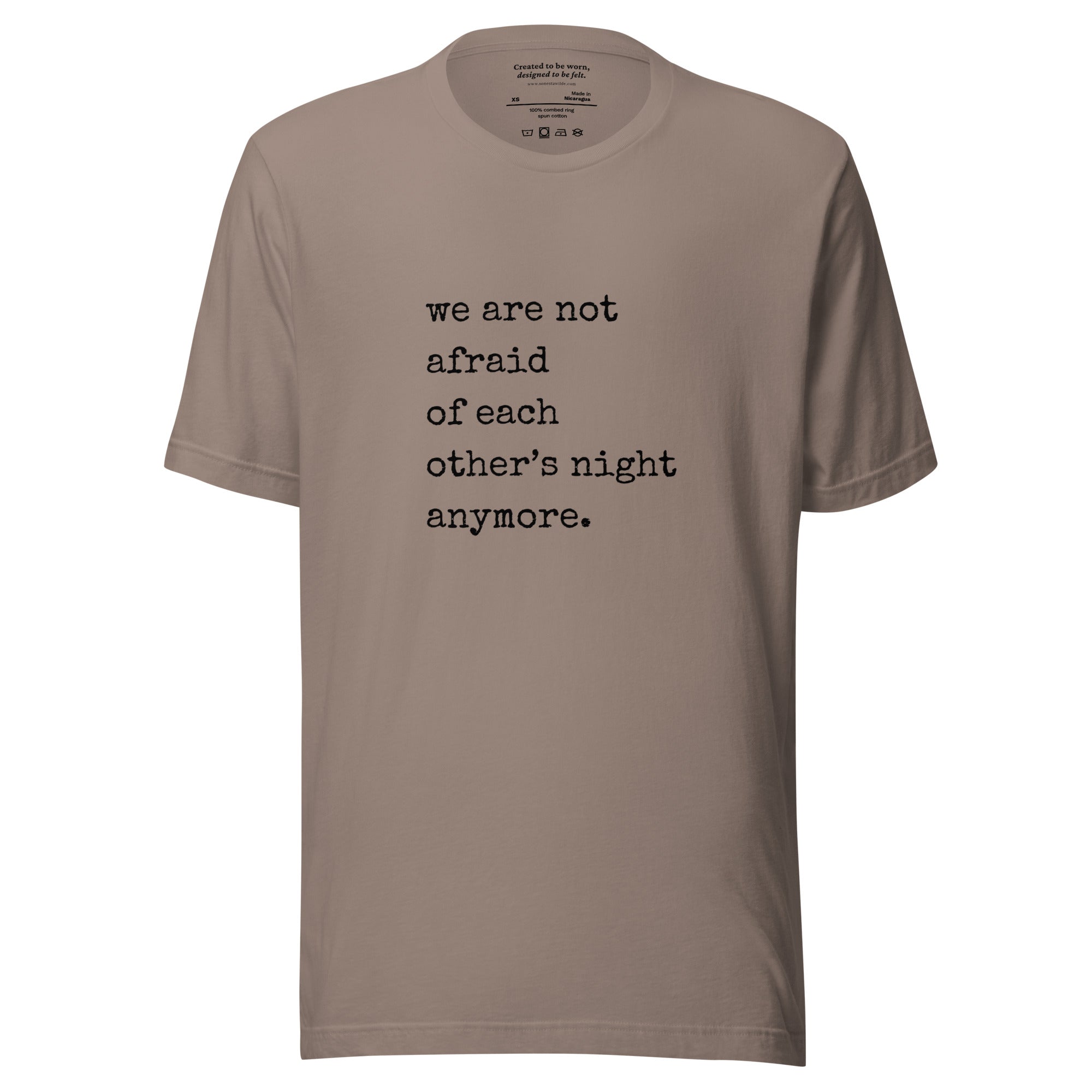 We are not afraid of each other’s night anymore. A mental health awareness shirt honoring resilience, solidarity, and healing. Pebble T-Shirt