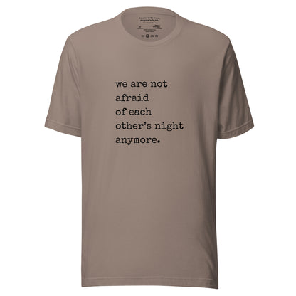 We are not afraid of each other’s night anymore. A mental health awareness shirt honoring resilience, solidarity, and healing. Pebble T-Shirt
