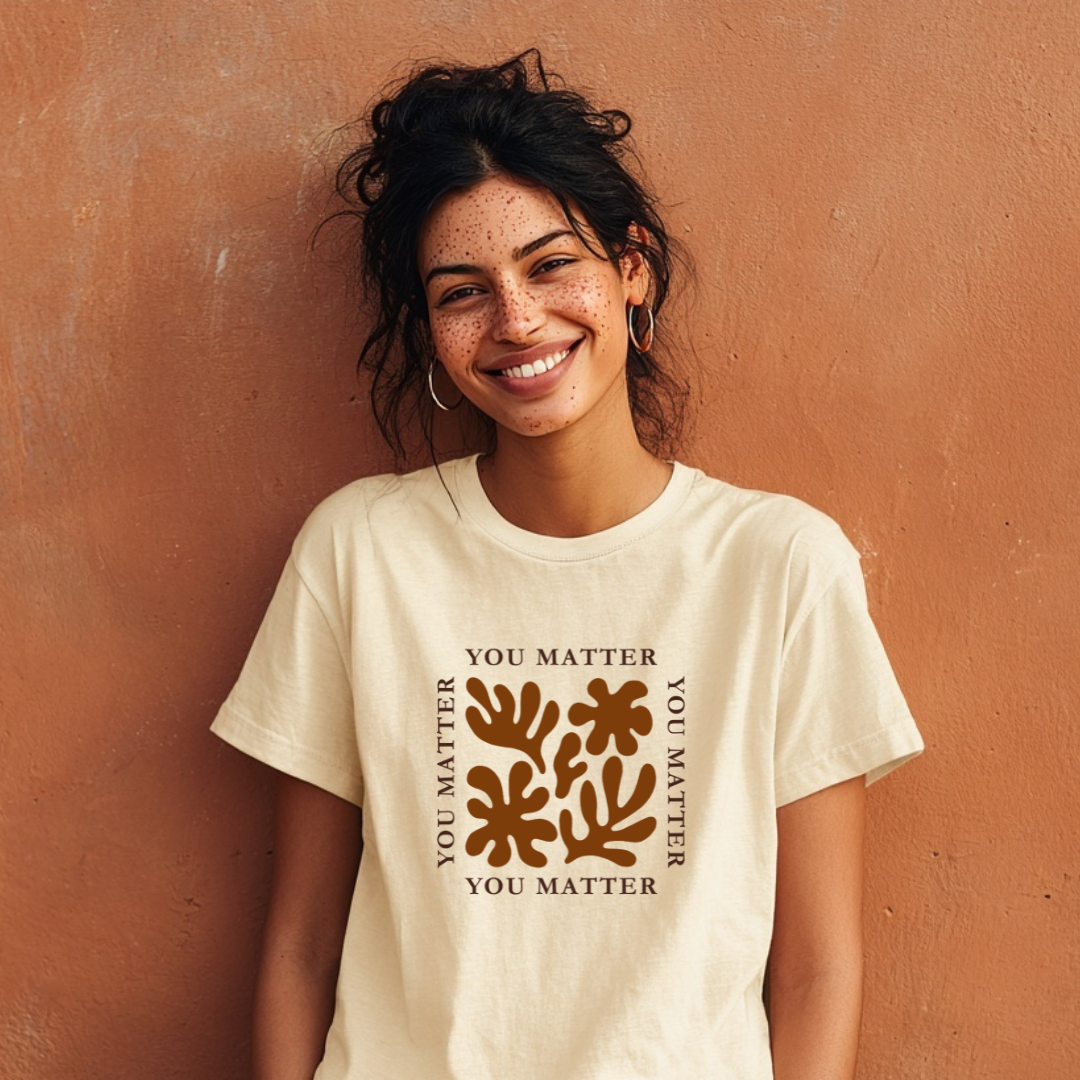 Woman wearing a white t-shirt with &